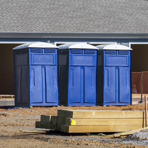 what is the cost difference between standard and deluxe portable restroom rentals in South Dos Palos